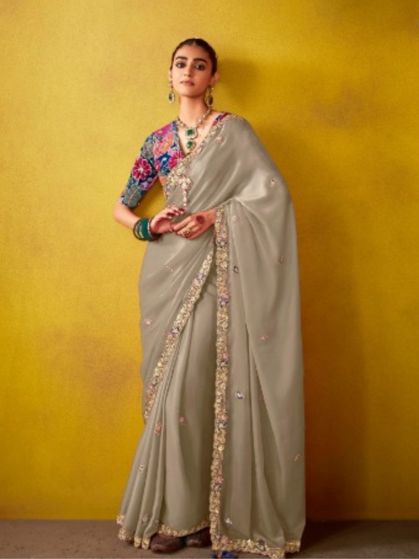 Elegant Saree with Embellished Border and Designer Blouse